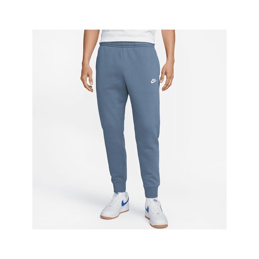 Joggery Nike Sportswear Club Fleece - Niebieski ze sklepu Nike poland w kategorii Spodnie męskie - zdjęcie 161527105