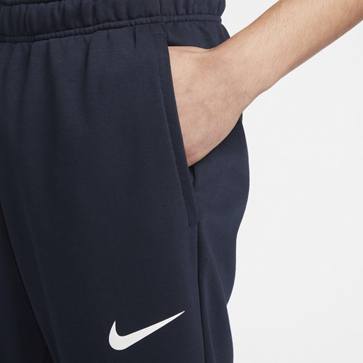 Męskie zwężane spodnie do fitnessu z dzianiny Dri-FIT Nike Dry - Niebieski Nike XXL Nike poland