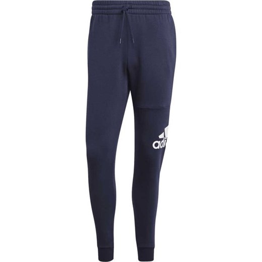Spodnie dresowe męskie Essentials Fleece Tapered Cuff Big Logo Adidas ze sklepu SPORT-SHOP.pl w kategorii Spodnie męskie - zdjęcie 161579216