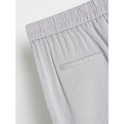 Spodnie damskie Reserved tkaninowe 