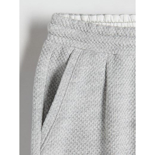 Spodnie chłopięce Reserved na jesień z bawełny 