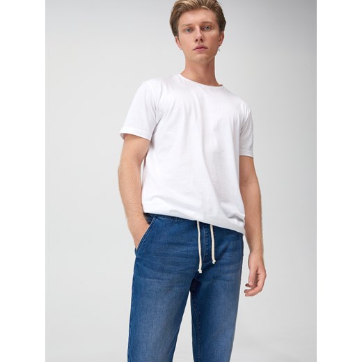 Sinsay - Jeansy jogger - niebieski Sinsay 38 Sinsay