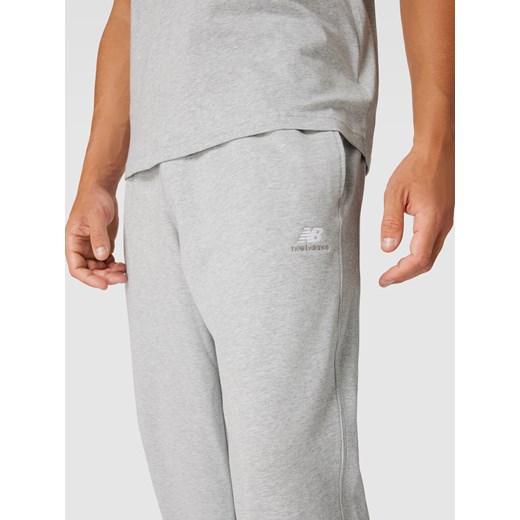 Spodnie dresowe z detalem z logo New Balance L Peek&Cloppenburg  okazyjna cena