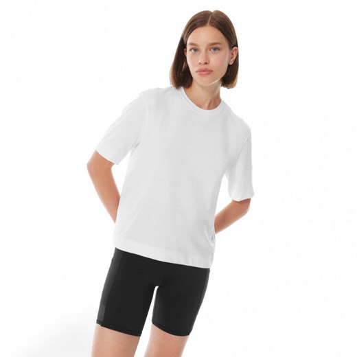 Damska koszulka treningowa Calvin Klein Women 00GWS3K104 - biała ze sklepu Sportstylestory.com w kategorii Bluzki damskie - zdjęcie 162390807