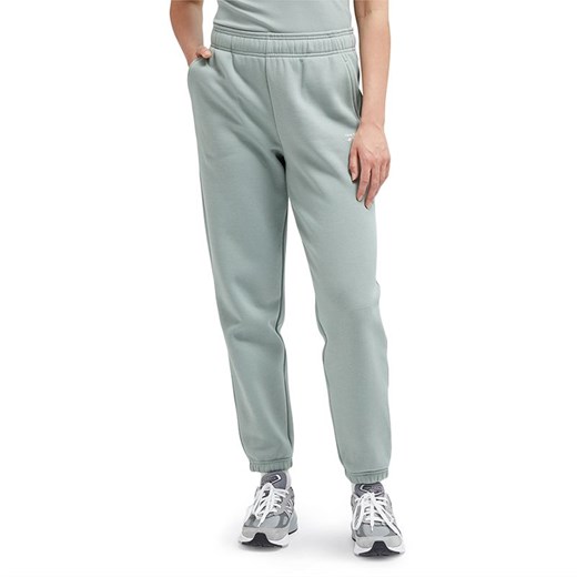 Spodnie New Balance WP33513JIR - niebieskie ze sklepu streetstyle24.pl w kategorii Spodnie damskie - zdjęcie 162903518