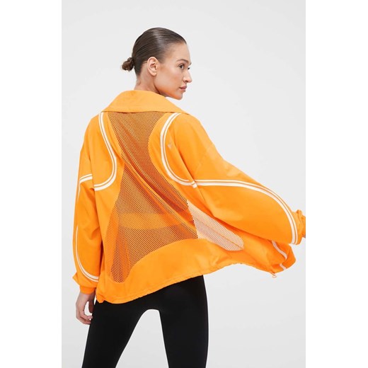 adidas by Stella McCartney wiatrówka TruePace kolor pomarańczowy przejściowa oversize ze sklepu ANSWEAR.com w kategorii Kurtki damskie - zdjęcie 163403947