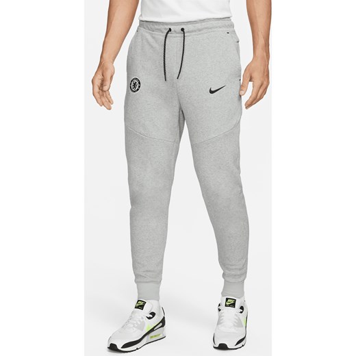Męskie joggery piłkarskie Nike Chelsea F.C. Tech Fleece (wersja trzecia) - Szary ze sklepu Nike poland w kategorii Spodnie męskie - zdjęcie 163459987