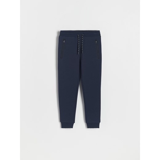Reserved - Dresowe spodnie jogger - granatowy ze sklepu Reserved w kategorii Spodnie chłopięce - zdjęcie 163469806