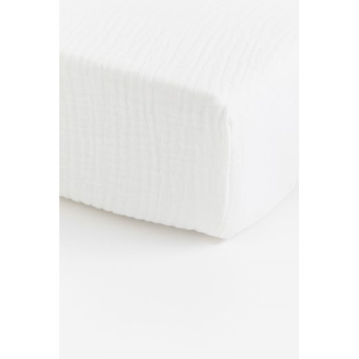 H & M - Muślinowe prześcieradło z gumką do łóżeczka - Biały H & M uniwersalny H&M