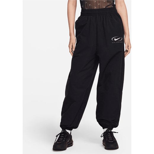Damskie joggery z tkaniny Nike Sportswear - Czerń ze sklepu Nike poland w kategorii Spodnie damskie - zdjęcie 163614799