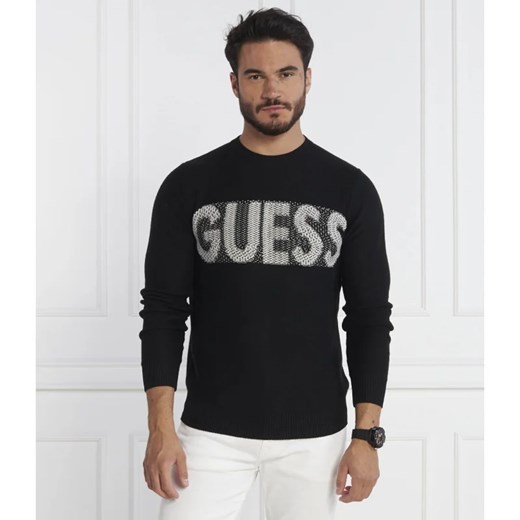 GUESS JEANS Sweter AMYAS LS CN SLOGAN SWTR | Regular Fit | z dodatkiem wełny M Gomez Fashion Store