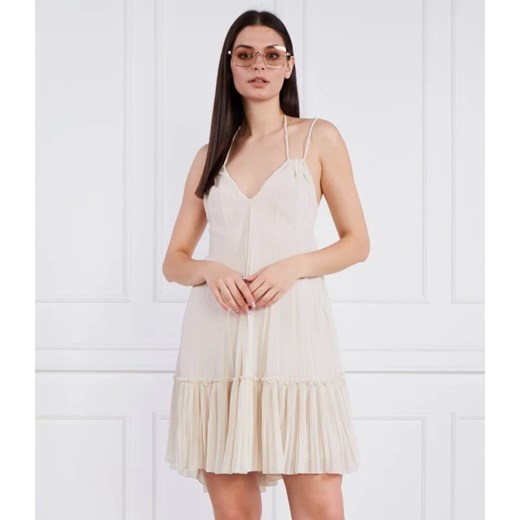 Beatrice B sukienka na ramiączkach beżowa elegancka mini z dekoltem v
