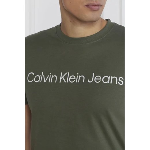 T-shirt męski Calvin Klein zielony młodzieżowy z napisem 