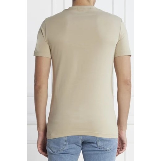 Beżowy t-shirt męski Calvin Klein młodzieżowy z krótkim rękawem 