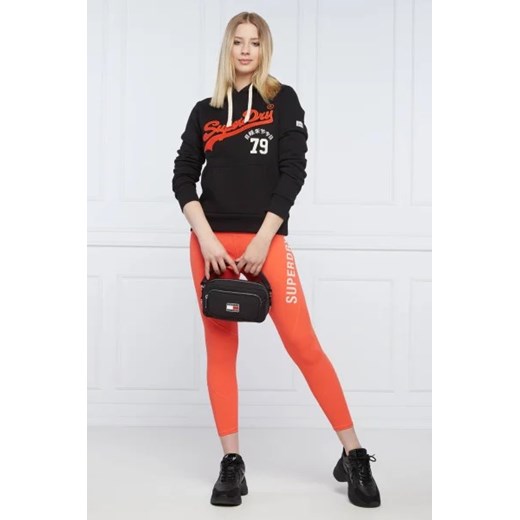 Spodnie damskie Superdry pomarańczowe wiosenne 