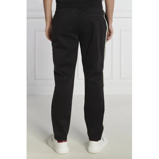 CALVIN KLEIN JEANS Spodnie dresowe CUT OFF LOGO TAPE | Regular Fit S Gomez Fashion Store