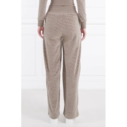 Juicy Couture Spodnie dresowe BEXLEY | flare fit Juicy Couture L okazyjna cena Gomez Fashion Store