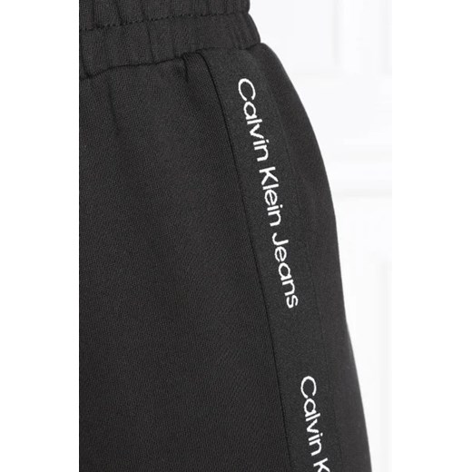CALVIN KLEIN JEANS Spodnie dresowe | flare fit M Gomez Fashion Store promocyjna cena