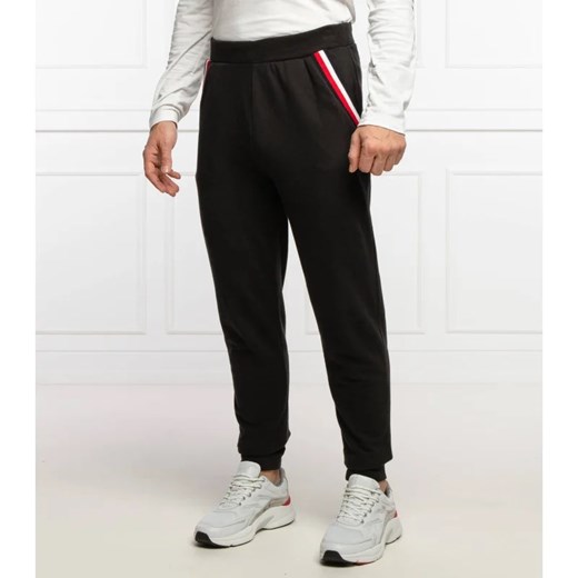 Tommy Hilfiger Spodnie dresowe | Regular Fit ze sklepu Gomez Fashion Store w kategorii Spodnie męskie - zdjęcie 164319675