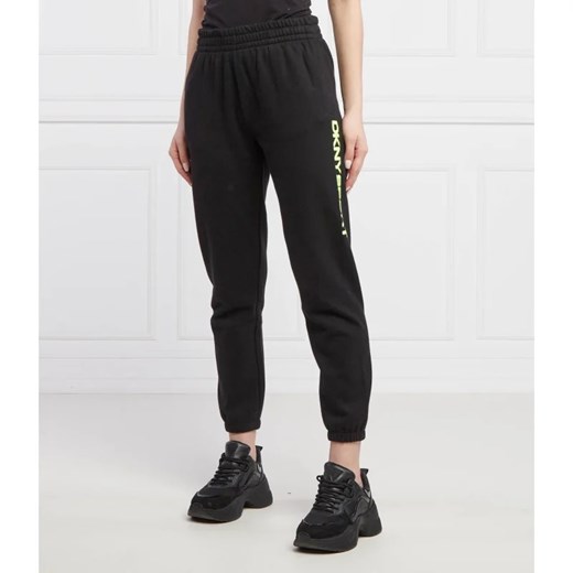 DKNY Sport Spodnie dresowe LAYERED | Regular Fit ze sklepu Gomez Fashion Store w kategorii Spodnie damskie - zdjęcie 164325148