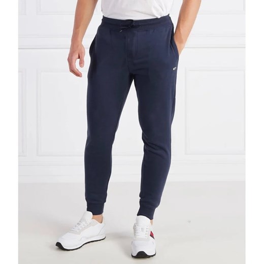 Tommy Jeans Spodnie dresowe TJM SLIM FLEECE SWEA | Slim Fit ze sklepu Gomez Fashion Store w kategorii Spodnie męskie - zdjęcie 164331899