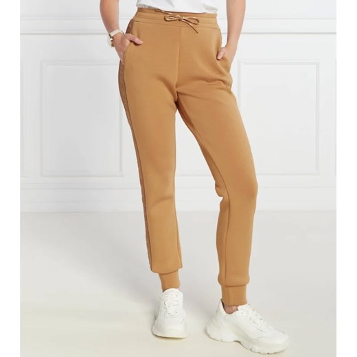 GUESS ACTIVE Spodnie dresowe ALLIE | Regular Fit ze sklepu Gomez Fashion Store w kategorii Spodnie damskie - zdjęcie 164334747