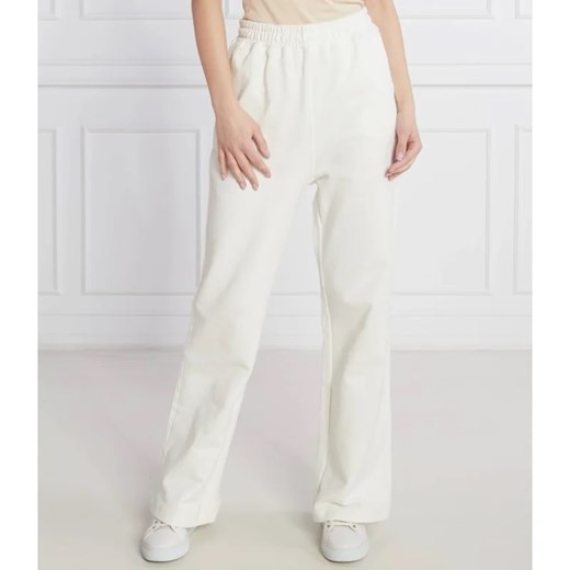 Tommy Sport Spodnie dresowe | Relaxed fit ze sklepu Gomez Fashion Store w kategorii Spodnie damskie - zdjęcie 164340306