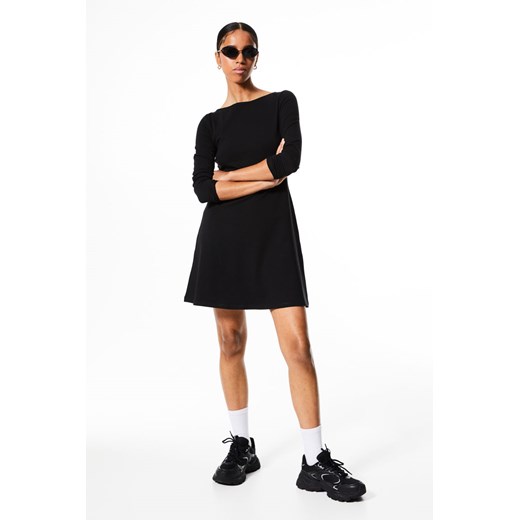 H & M - Dżersejowa sukienka z rozszerzanym dołem - Czarny H & M M H&M
