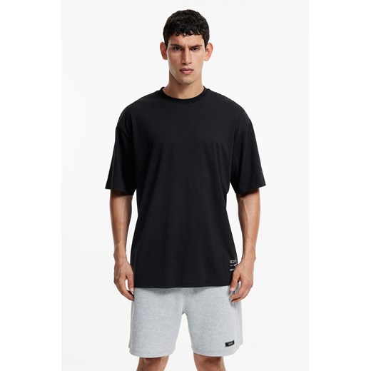H & M - T-shirt sportowy Loose Fit DryMove - Czarny H & M uniwersalny H&M