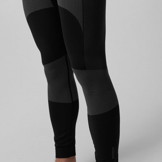 Męskie legginsy termoaktywne Outhorn OTHAW23USEAM102 - czarne ze sklepu Sportstylestory.com w kategorii Bielizna termoaktywna męska - zdjęcie 165336648