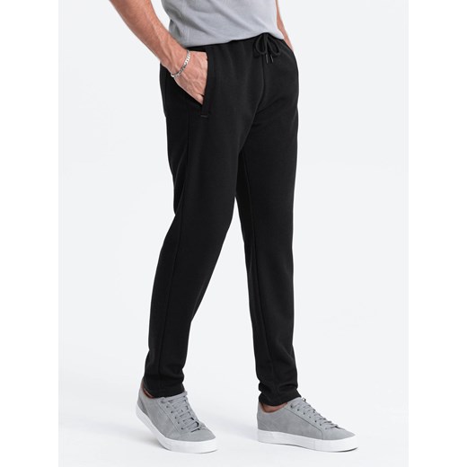 Męskie spodnie dresowe o marchewkowym kroju - czarne V1 OM-PASK-0166 ze sklepu ombre w kategorii Spodnie męskie - zdjęcie 165521359