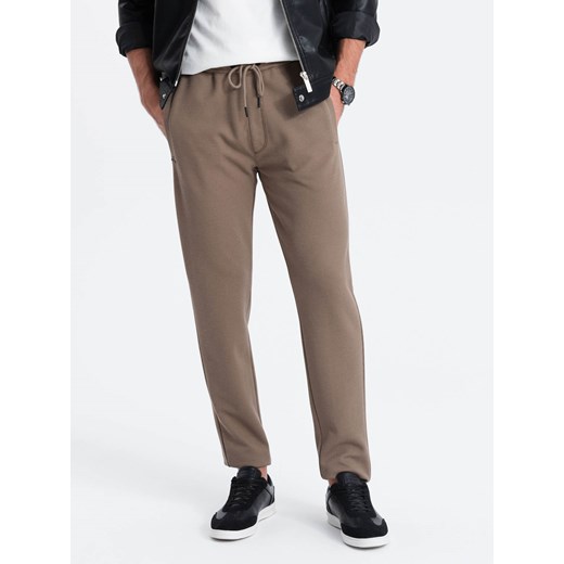 Męskie spodnie dresowe o marchewkowym kroju - brązowe V2 OM-PASK-0166 ze sklepu ombre w kategorii Spodnie męskie - zdjęcie 165521369