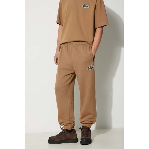 Lacoste spodnie dresowe bawełniane kolor brązowy gładkie ze sklepu PRM w kategorii Spodnie męskie - zdjęcie 166193298