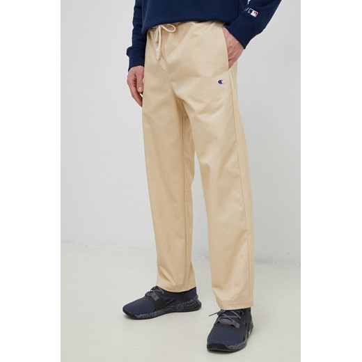Champion spodnie męskie kolor beżowy proste 216544-TTP ze sklepu PRM w kategorii Spodnie męskie - zdjęcie 166194529
