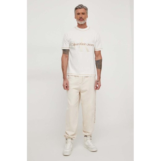 T-shirt męski wielokolorowy Calvin Klein z krótkim rękawem z napisem 