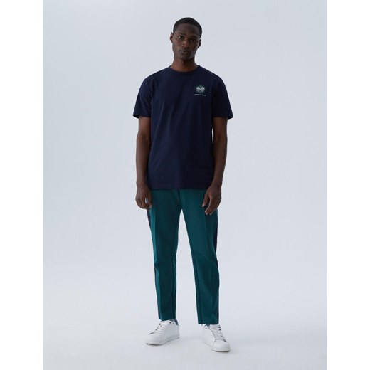 Spodnie Dresowe VOLLEY Zielony S ze sklepu Diverse w kategorii Spodnie męskie - zdjęcie 166698436