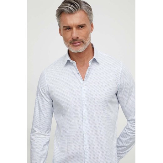 Calvin Klein koszula męska kolor biały slim z kołnierzykiem klasycznym ze sklepu ANSWEAR.com w kategorii Koszule męskie - zdjęcie 166929055