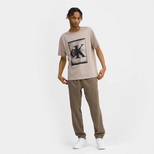 Męska koszulka treningowa Calvin Klein Men 00GMS3K113 - beżowa Calvin Klein S wyprzedaż Sportstylestory.com