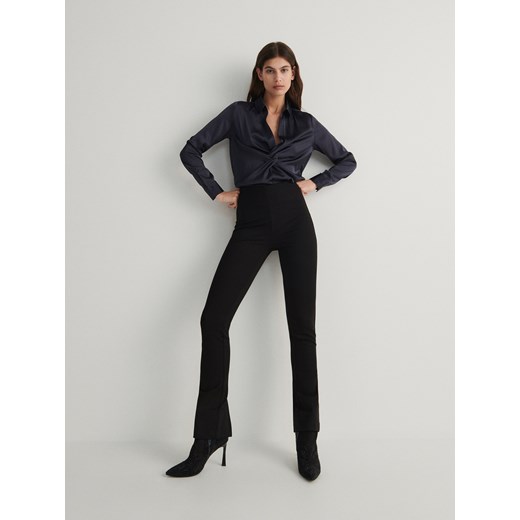Reserved - Spodnie z rozcięciami - czarny ze sklepu Reserved w kategorii Spodnie damskie - zdjęcie 167448298