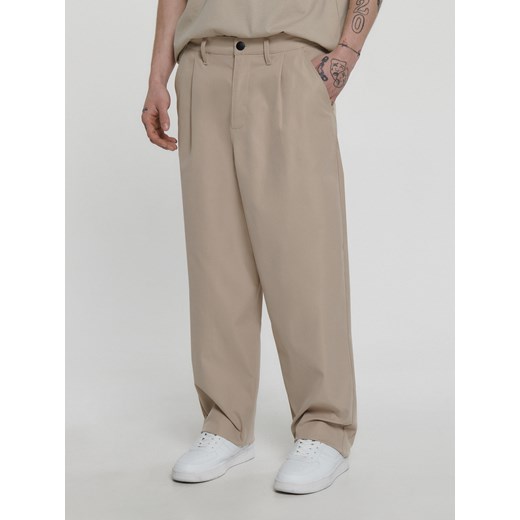 Cropp - Beżowe spodnie loose ADU.LTD - beżowy Cropp 30 Cropp okazja