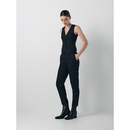 Reserved - Spodnie z metalicznym efektem - czarny ze sklepu Reserved w kategorii Spodnie damskie - zdjęcie 167620177