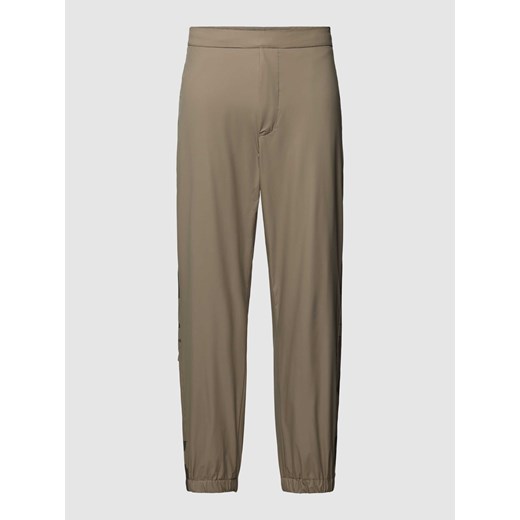 Spodnie dresowe z wpuszczanymi kieszeniami w stylu francuskim model ‘Lotus’ ze sklepu Peek&Cloppenburg  w kategorii Spodnie męskie - zdjęcie 167674779