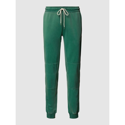 Spodnie dresowe o kroju standard fit z elastycznym pasem i szwami działowymi ze sklepu Peek&Cloppenburg  w kategorii Spodnie męskie - zdjęcie 167681568
