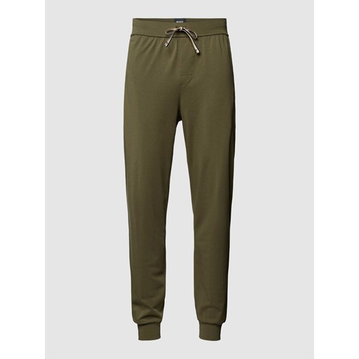 Spodnie dresowe o kroju regular fit z elastycznym pasem i tunelem ze sklepu Peek&Cloppenburg  w kategorii Spodnie męskie - zdjęcie 167697676