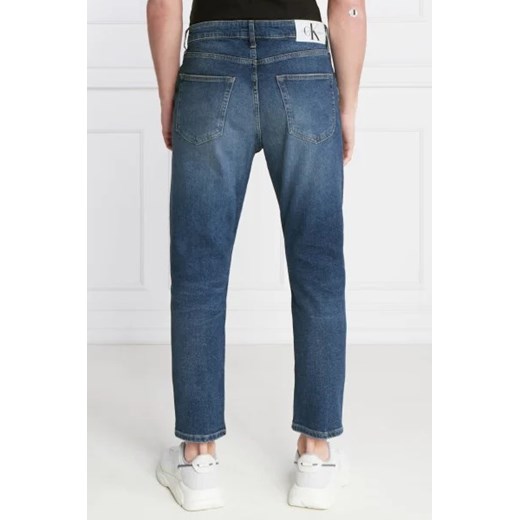 Niebieskie jeansy męskie Calvin Klein
