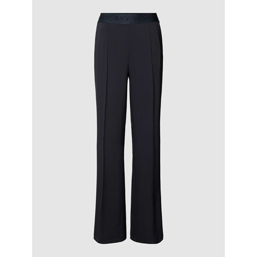Spodnie materiałowe rozkloszowane z elastycznym paskiem z logo ze sklepu Peek&Cloppenburg  w kategorii Spodnie damskie - zdjęcie 167764395