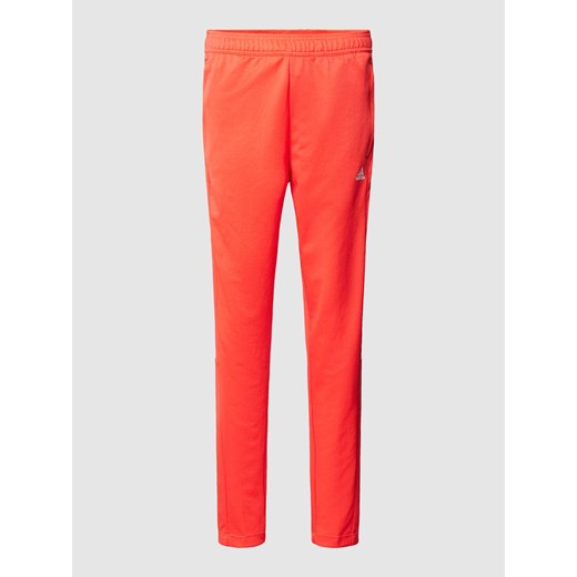 Spodnie dresowe z nadrukiem z logo model ‘TIRO’ ze sklepu Peek&Cloppenburg  w kategorii Spodnie damskie - zdjęcie 167941057