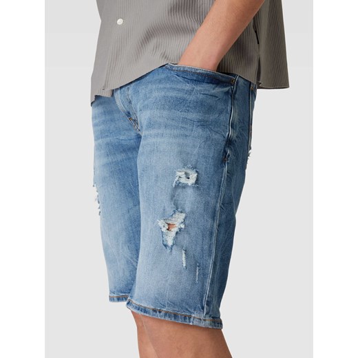 Szorty jeansowe z przetarciami model ‘RONNIE’ Tommy Jeans 34 promocja Peek&Cloppenburg 