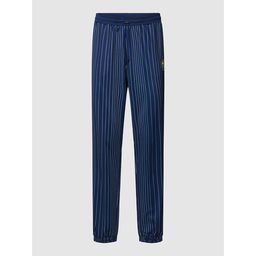 Spodnie dresowe ze wzorem w paski model ‘TAARSTEDT STRIPED’ ze sklepu Peek&Cloppenburg  w kategorii Spodnie męskie - zdjęcie 168103335