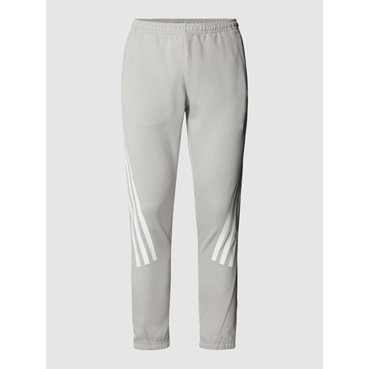 Spodnie dresowe z paskami w kontrastowym kolorze Adidas Sportswear M Peek&Cloppenburg 